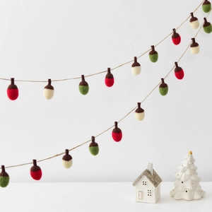 Handmade wool felt acorn garland in red, green, and white for Christmas home decoration