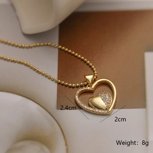 Detail view of 18K gold plated heart pendant necklace showing 2.4cm width and 8g weight