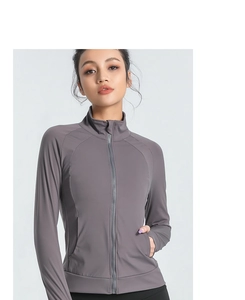 Detail of slim-fit yoga jacket showing stand collar and high-stretch quick-dry fabric