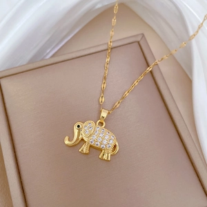 Elegant gold titanium steel necklace featuring a crystal-encrusted elephant pendant