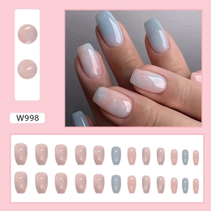 Short ballet press-on nails with blue and pink marble gradient and glossy finish