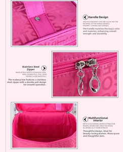 Detail of pink satin makeup bag showing dual steel zippers and multi-slot inner compartment
