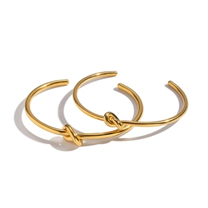 Polierte 18K Gold Knoten-Armreifen mit geometrischem minimalistischem Stil für Damen