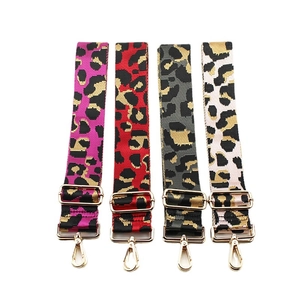 Adjustable leopard print bag strap in four colors with gold metal hooks and buckles