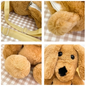 Detail view of cartoon plush dog backpack showing adjustable straps and soft fur texture