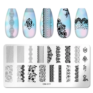 Macro detail of stainless steel nail art plate OM-H11 with lace and floral patterns