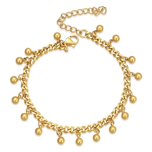 Detailed view of a gold beaded stainless steel bracelet with adjustable lobster clasp