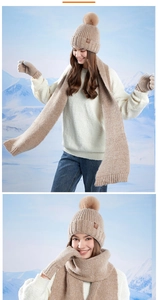 Three-piece winter knit set with pom-pom beanie, long scarf, and gloves in khaki color