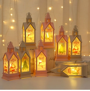 Close-up of LED Christmas lanterns with Merry Christmas print and festive warm lighting