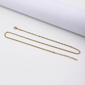 Detail of 18K gold plated stainless steel necklace with lobster clasp and extender chain