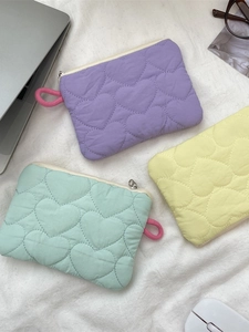 Quilted heart macaron mini makeup pouches in lavender, mint green, and pale yellow