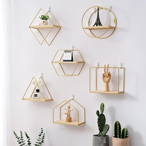 Nordic wall shelf set with geometric gold metal frames and wooden base for home decor