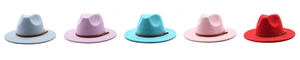 Flat lay of wide brim wool fedora hats in five colors with brown leather belts