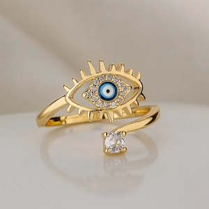 Golden Evil Eye open ring with white cubic zirconia and blue enamel center stone