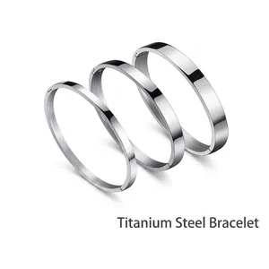 Polished silver titanium steel bangle set with minimalist clasp for men and women