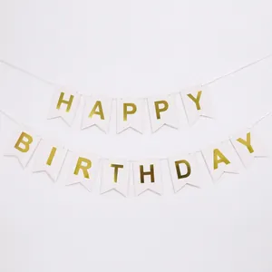 Detailed view of white swallowtail Happy Birthday banner with gold foil letters