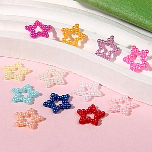 Close-up of colorful hollow star-shaped faux pearl beads for DIY craft accessories