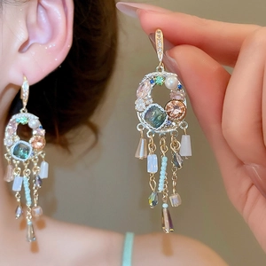 Bohemian leaf beaded tassel earrings with crystal stones and pearls in gold finish