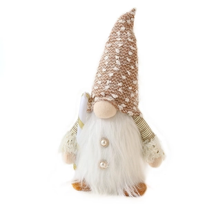 Plush Christmas gnome with long white beard, textured hat and pearl details on white background