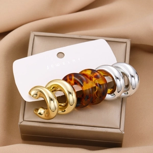 Vintage C-shaped earring set with gold, silver, and leopard print resin textures
