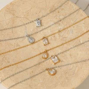 Double-layer stainless steel necklaces with sparkling zircon pendants in gold and silver