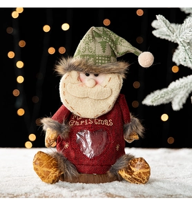 Détail du sac cadeau Père Noël en toile avec fenêtre cœur sur neige artificielle