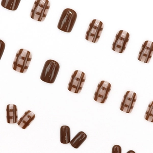 Short square press-on nails in glossy caramel brown plaid and solid chocolate finish