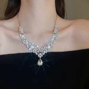 Elegant multi-layered V-shaped rhinestone necklace set with teardrop pendant for women