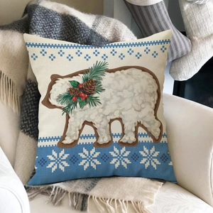 Detailed view of linen Christmas pillow cover with polar bear and snowflake embroidery
