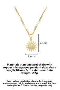 Detailed view of gold sunflower pendant with micro-pave white zircon and steel chain