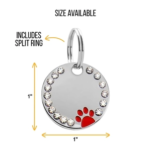 Polished silver pet tag with red paw print design and rhinestones, 1-inch diameter size
