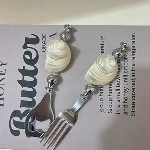 Elegant shell-handle fork and bottle opener set with stainless steel finish