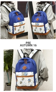 Three-piece floral canvas backpack set with dark blue color block and leather details