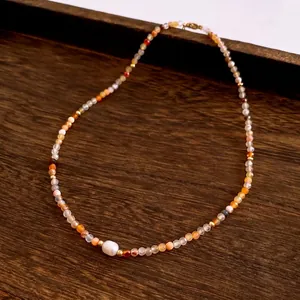 Minimalist freshwater pearl and warm stone beaded necklace with gold metal accents