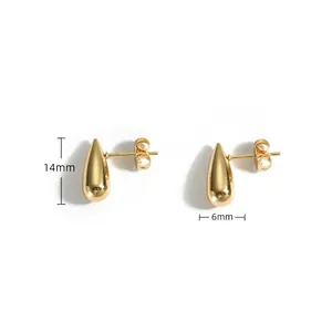 Detailed view of gold teardrop earrings measuring 14mm by 6mm with 4g weight