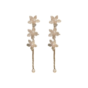 Elegant white floral earrings with silver tassel and pearl accents on white background