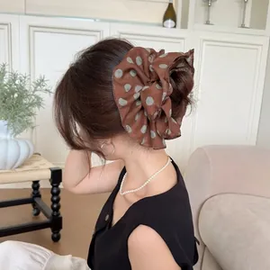 Brown polka dot chiffon scrunchie with ribbons for French retro low ponytail hairstyle