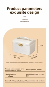 Dual-layer leather jewelry box detail with top handle and gold metal security lock