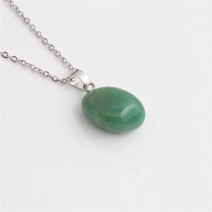 Minimalist silver chain necklace featuring an oval green aventurine gemstone pendant