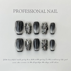Handmade black cat-eye press-on nails set with 3D crystals and silver metallic charms