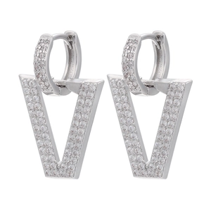 Macro shot of silver V-shape earrings with micro-paved white cubic zirconia stones
