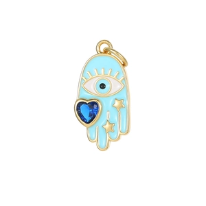 Hamsa hand pendant in 14K gold plated copper with blue enamel and heart-shaped zircon