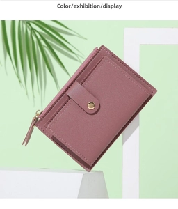 Detail view of pink PU leather card holder with multiple slots and zipper pocket