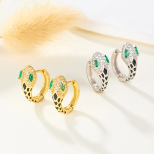 S925 Sterling Silver snake hoop earrings with green zircon eyes and black enamel detail