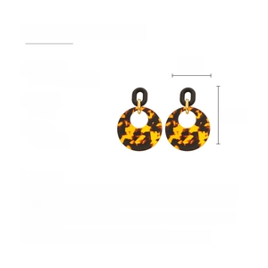 Detail view of tortoiseshell resin hoop earrings with dimensions showing 7cm by 5cm