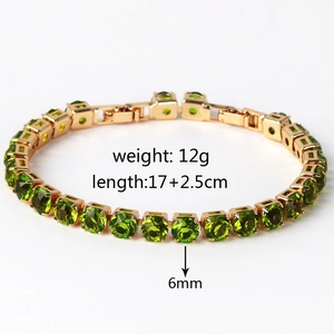 Detail view of 6mm green zircon tennis bracelet in gold finish with size and weight specs