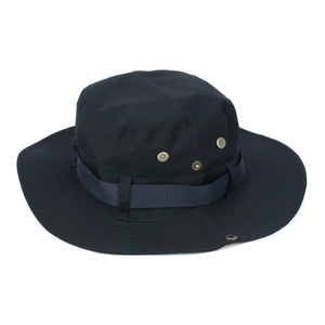 Detail of black boonie hat featuring metal ventilation eyelets and tactical webbing strap