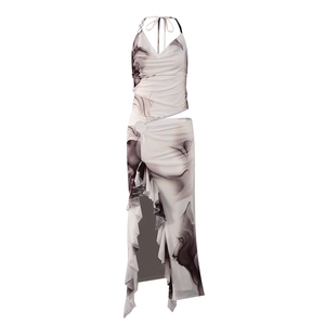 Detail of halter neck top and slit skirt with black and white marble ink print