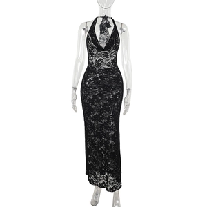 Close-up of the intricate black lace texture and halter neck design on a slim-fit dress