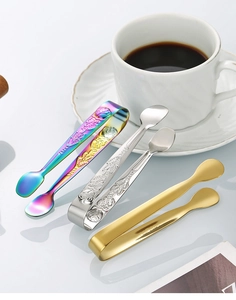 Macro detail of 304 stainless steel rose embossed mini ice tongs in various colors